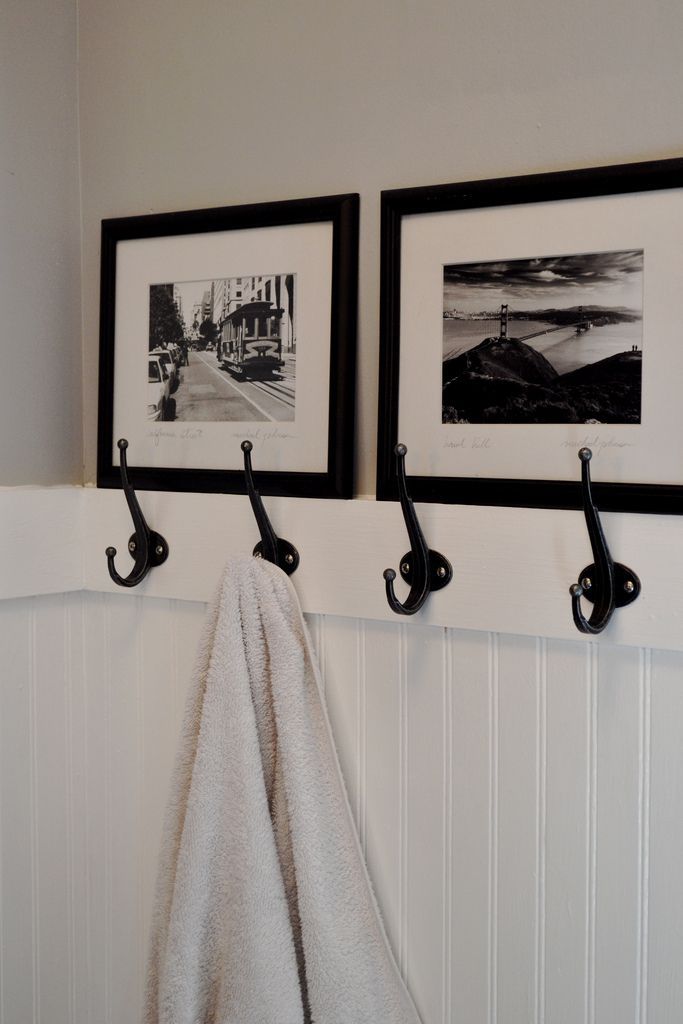 Love the beadboard, hooks and photo decor. Kinda wish we had done this instead of our double towel bar, which takes the same