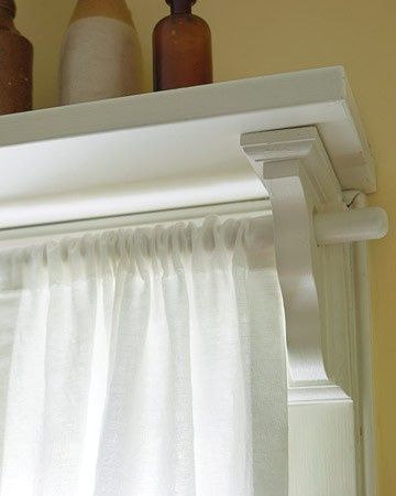 LOVE this!! Put a shelf over a window and use the shelf brackets to hold a curtain rod- genius and beautiful AND gives a