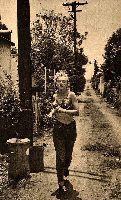 Marilyn Monroe jogging in an alley in Hollywood, 1951