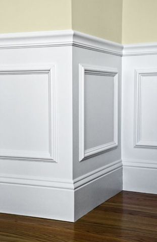 Totally doing this! Buy cheap frames from michaels for wainscoting and add baseboard at top and paint everything white!