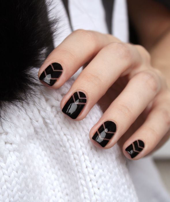 Black negative space nail design with striping tape