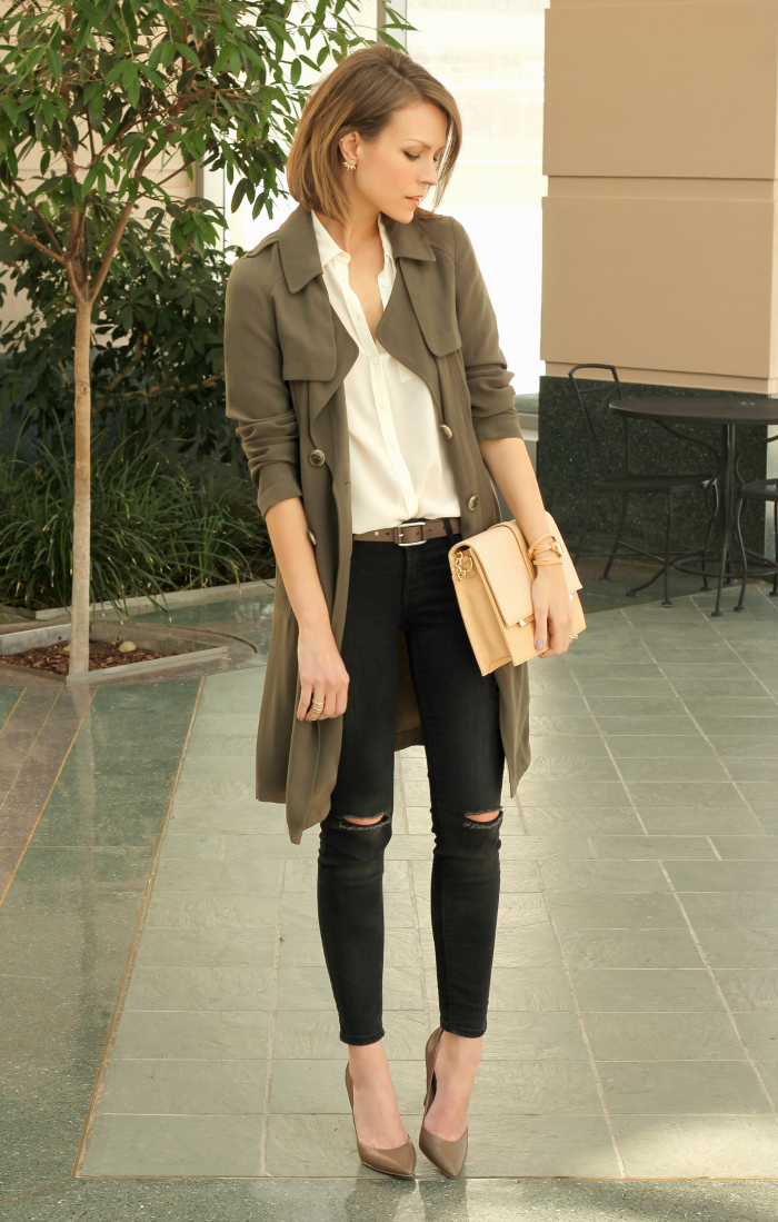 Don a draped trench in olive green this fall with lightly distressed denim and classic pumps.