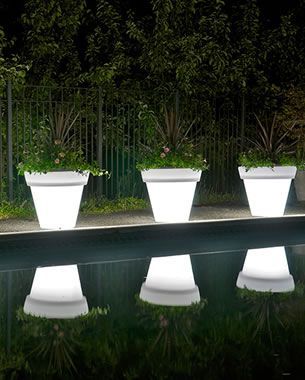 Use mausoleum glow in the dark paint instead of buying solar powered pots. Although they are really cool.