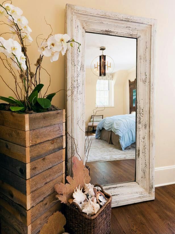 I’m crazy over large oversized mirrors sitting on the floor like this to use as a full length mirror.