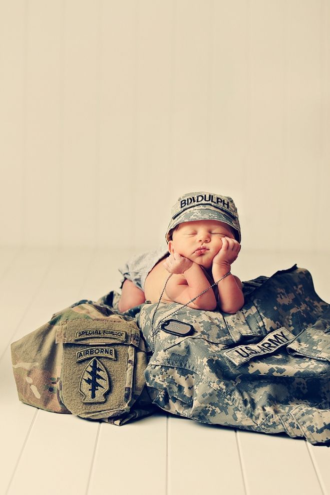 Military Newborn Photography….maybe something similar with my husband’s police uniform?
