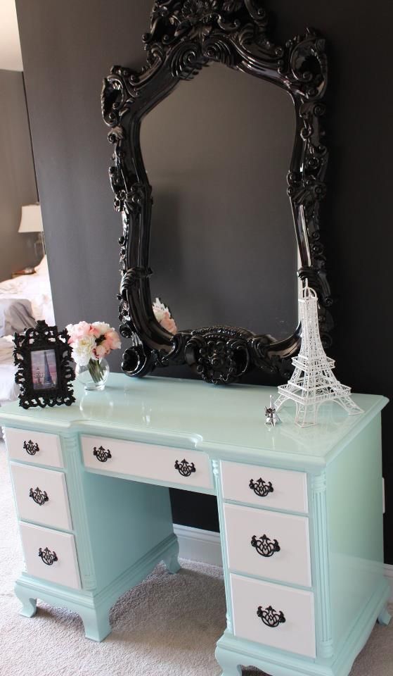 Stunning vanity with black chunky mirror. I would paint the dresser part all one color though (a brighter