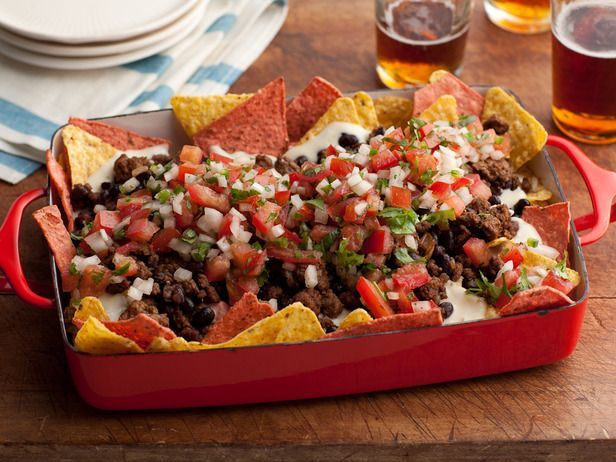 Super Nachos: Rachael tops her Mexican-style meal with traditional nacho fixings, including homemade pico de gallo salsa, made