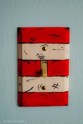 The Dr. Seuss theme custom wall switchplates that I painted myself: The first thing we did in to decorate