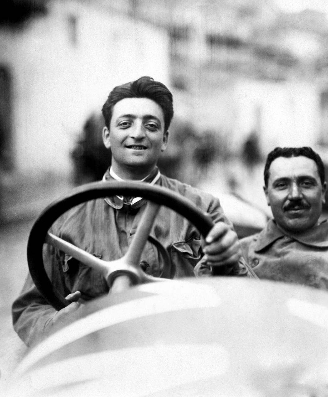 This beautiful old image shows Enzo Ferrari as a young man (on the left), he was racing in the 1920 Targa