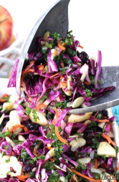 I love the flavors in this beautiful Apple, Kale and Cabbage Salad.  Crunchy carrots, raw kale and red cab