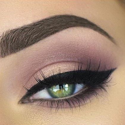 Pink smokey eye with perfect brows.