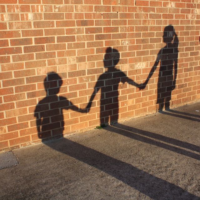 Shadows on a brick wall. Fun picture to take of the kids. Tracy, can you do this? :)