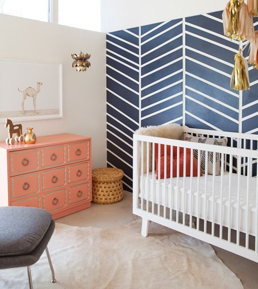 super cute peach, navy and white nursery decor