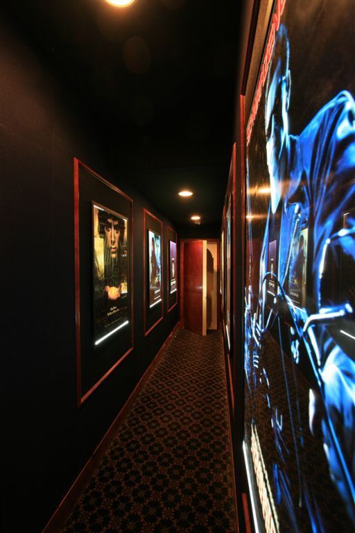 YES!!! Hallway leading to home theater room. Lined with your Favorite movies. VERY AWESOME!!