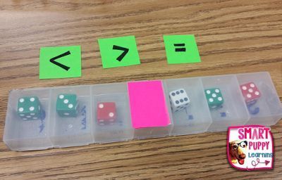 Dice in pill containers for comparing numbers, place value, addition and subtraction. Lots of game ideas.