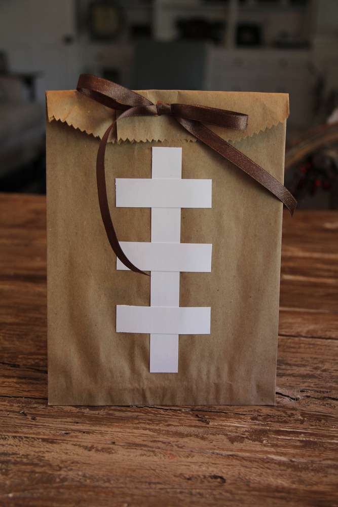 Football party paper bag favors! See more party planning ideas at CatchMyParty.com!