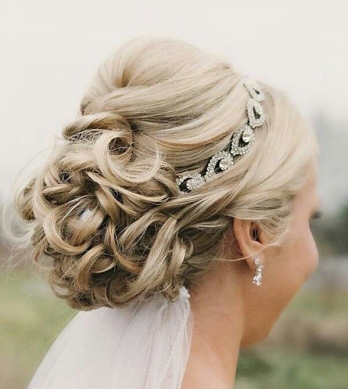 Glorious Beautiful Wedding Updo With Crystal Headband and Veil hairstyle