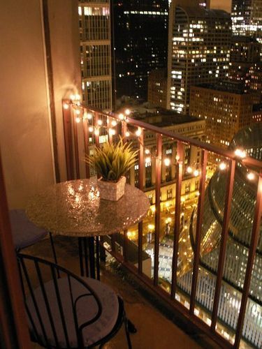 lighting and table :)  Chicago high-rise studio apartment – Balcony by flowerwine, via Flickr