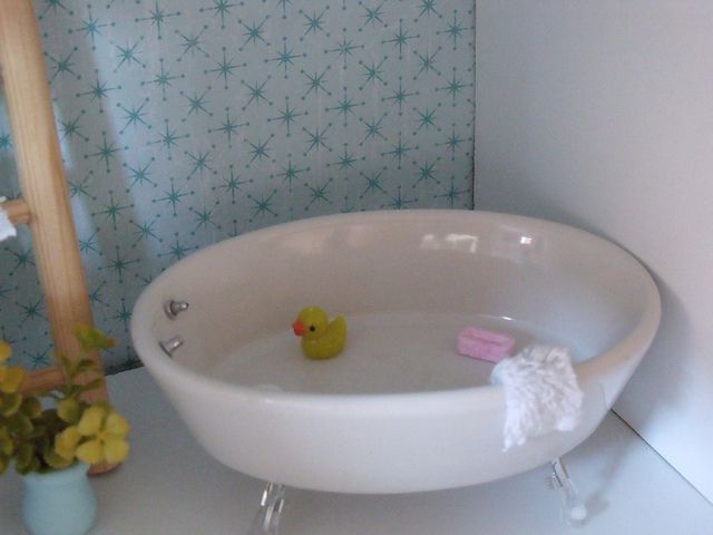 tub: soap dish claw feet: clip-on earring backs faucet knobs: earring stud backs duck: charm with hook rem
