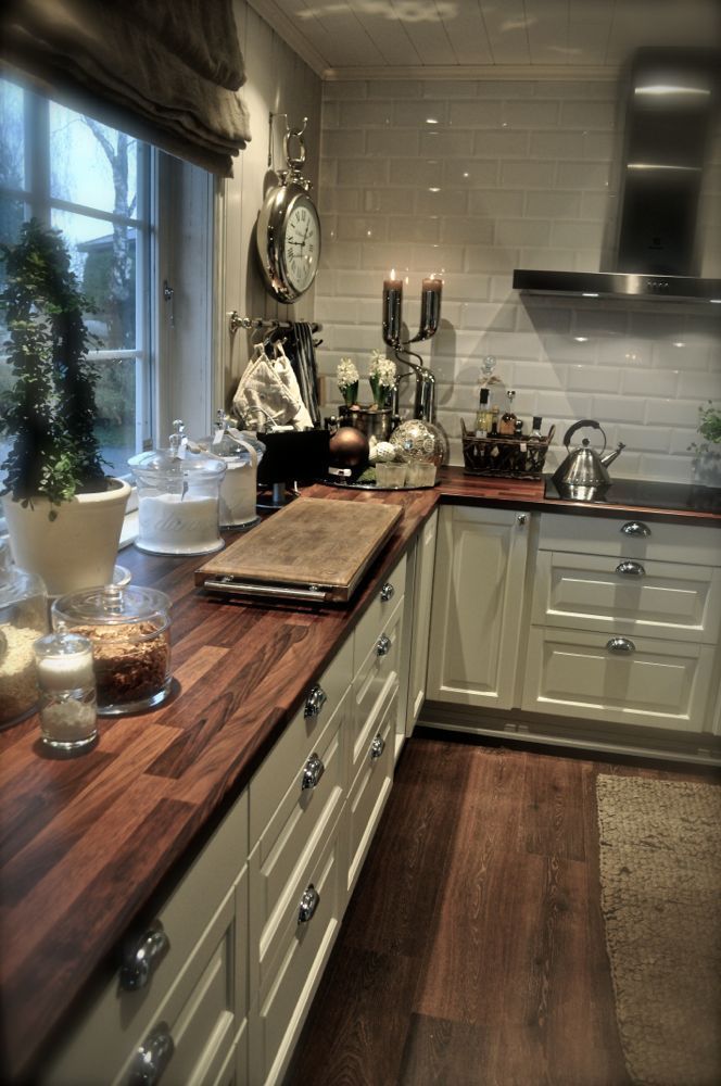 Wow! Love the white cabinets an the wood counter tops, I want this in my kitchen!