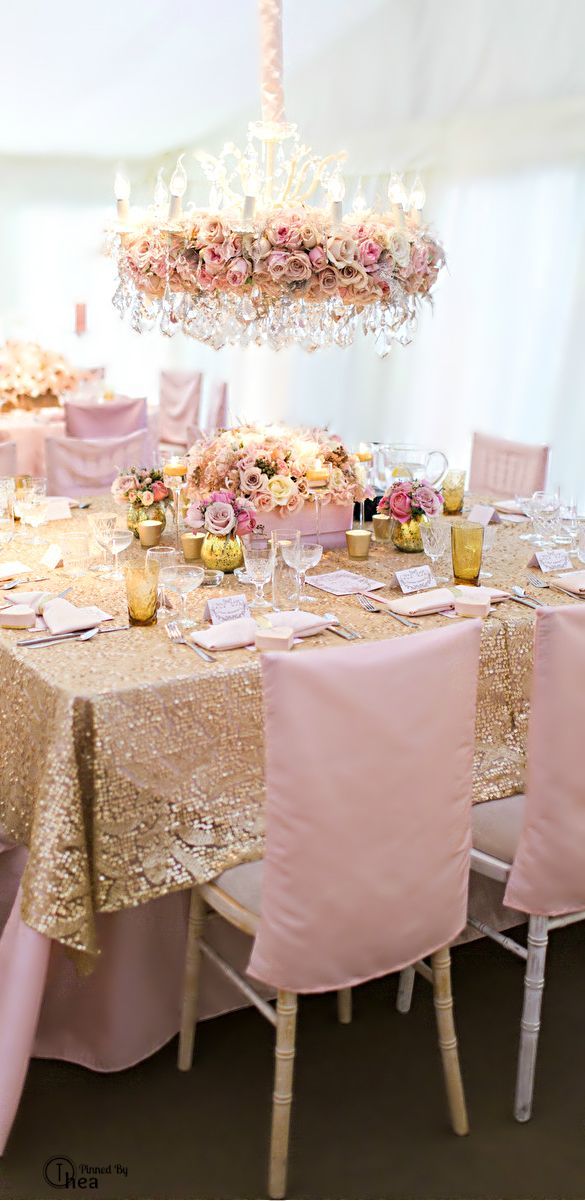 gold sequin table overlays (will be over ivory) but this would look good with peach/coral napkins!
