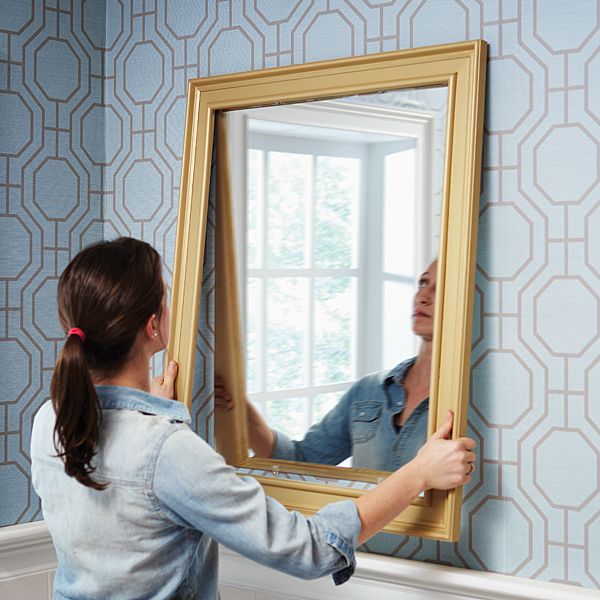 Install your DIY mirror frame by hanging it onto the mirror. -   Great DIY Mirror frame ideas