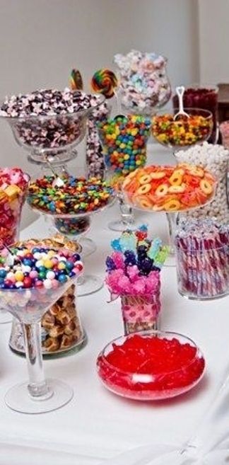 Instead of wedding favours, fill up the candy bar and let guests choose their bags and what they want