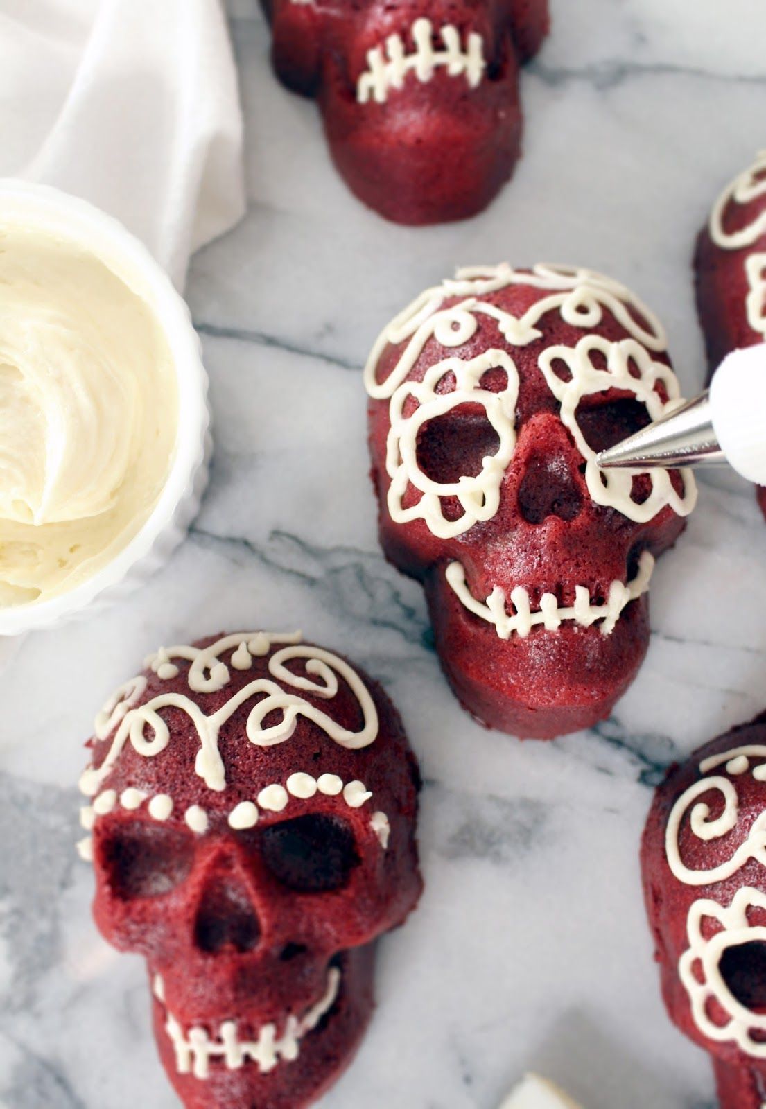 Mini Red Velvet Skull Cakes from Shore Society. A spooky Halloween treat thats not too scary to e