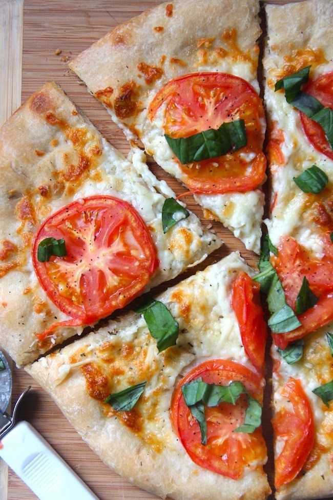 Perfectly simple tomato margherita pizza. Light, fresh, and perfect for the new year!