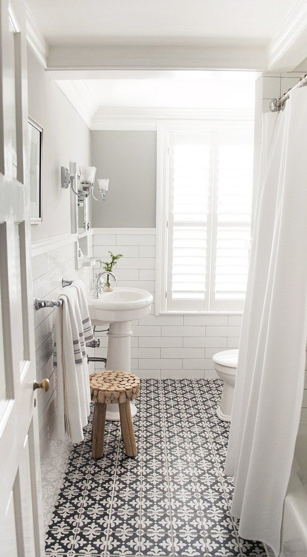 Tile – black and white for shower floor Bathroom with white subway tile and patterned encaustic floor