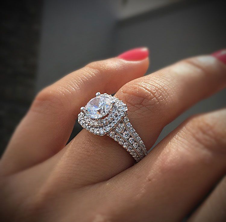 A beautiful double halo diamond engagement ring from Gabriel & Co. in white gold.