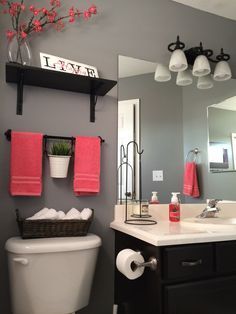 Bathroom decor tips on a budget… Love this gray and red!
