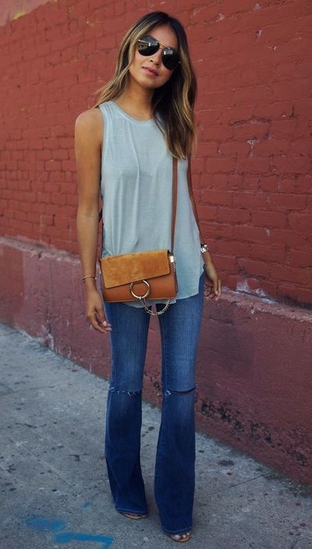 Love the simple top! Flare jeans like but without holes in the knees.