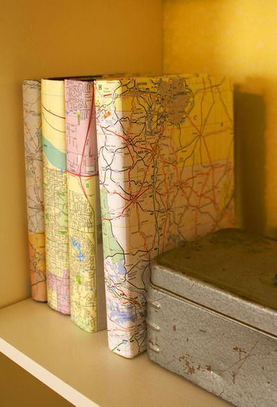 *using maps to cover books, love this look for a bookcase display