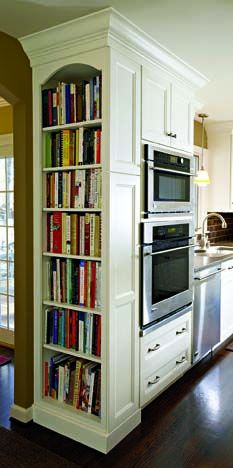 A kitchen bookshelf that could store cook books, light reading, or just be used fo