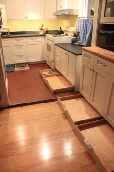 toe kick drawers. Awesome idea for the unused space under your cabinets!
