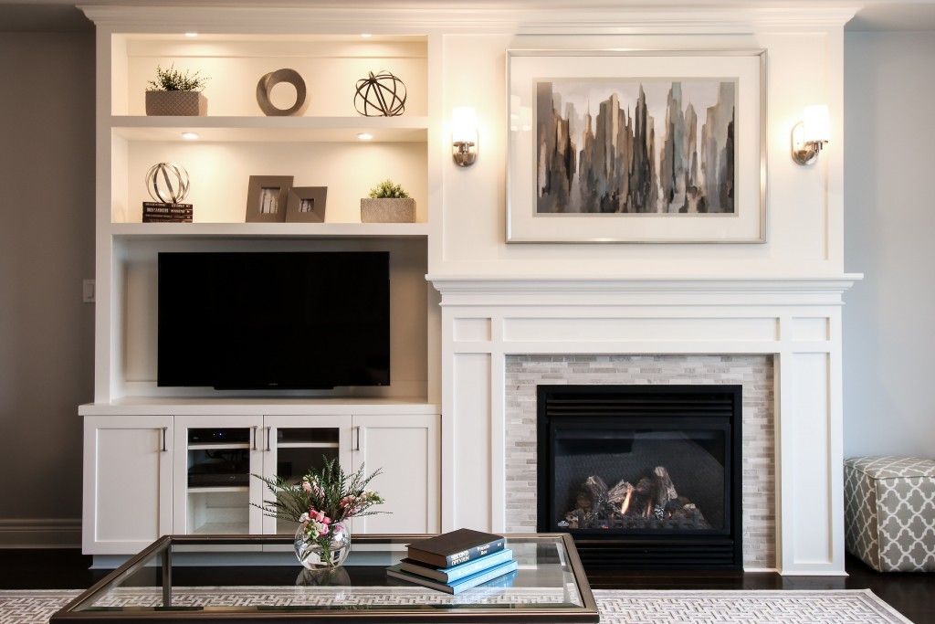 A built-in shelving unit creates balance with an off-center fireplace.