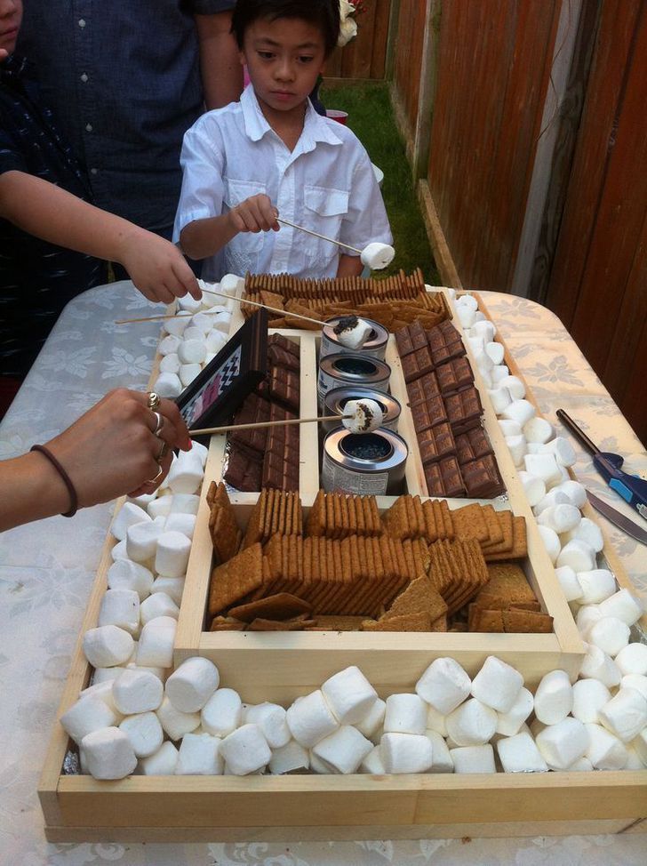 Engagement party DIY smores bar. Perfect for an outdoor party.