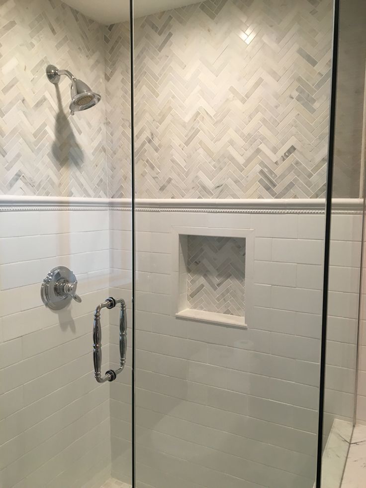 Love the this shower and the gray and white tile, chevron marble and subway design.