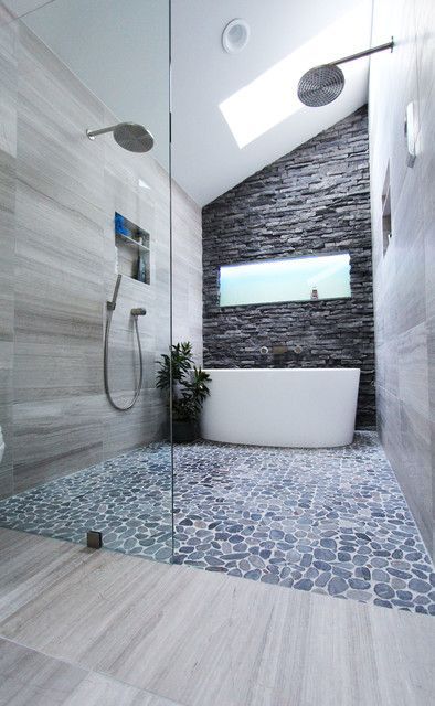 Our black sliced pebble tile is an incredibly popular style with a unique grayish black hue. Made from natural Indonesian river