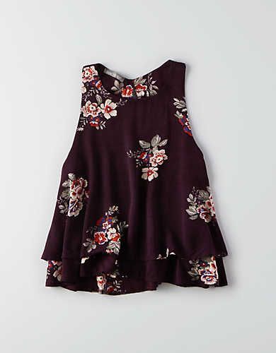 I like this plum color and the cut of this shirt. I also sort of like the floral pattern, but Im not quite sure if I would like it