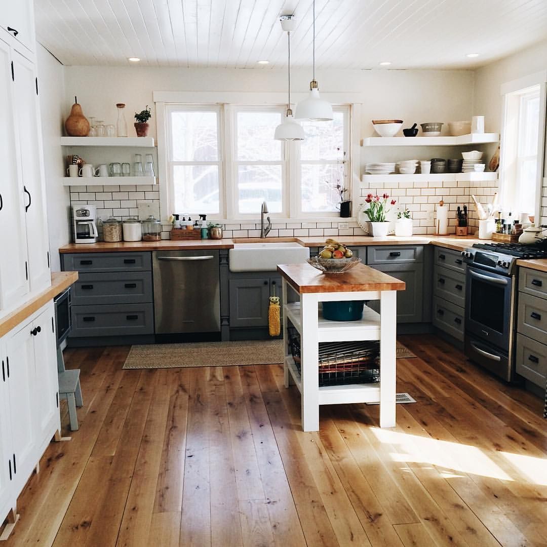 I love the butcher block countertops and dark grout subway tile in this country kitchen See this Instagram photo by