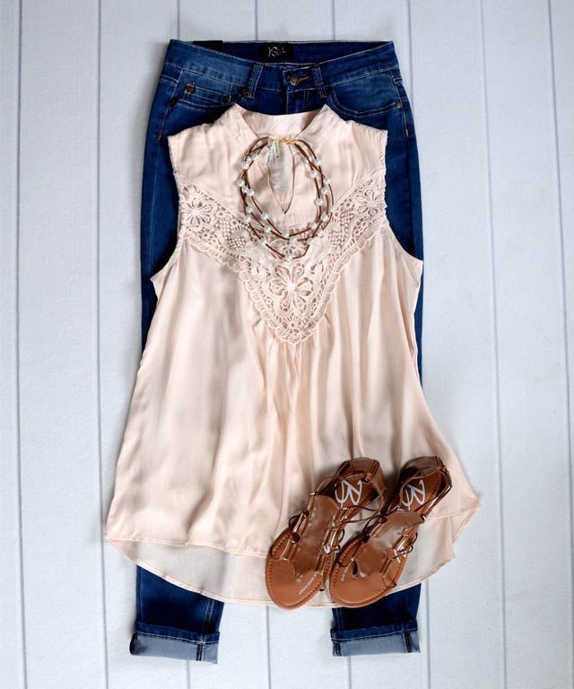 Really like this blouse. I like that its sleeveless and feminine. Would pair with cropped jeans and sandals.