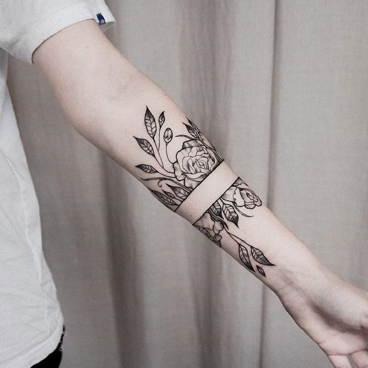 Black ink rose tattoo with split in the same arm by dogma_noir