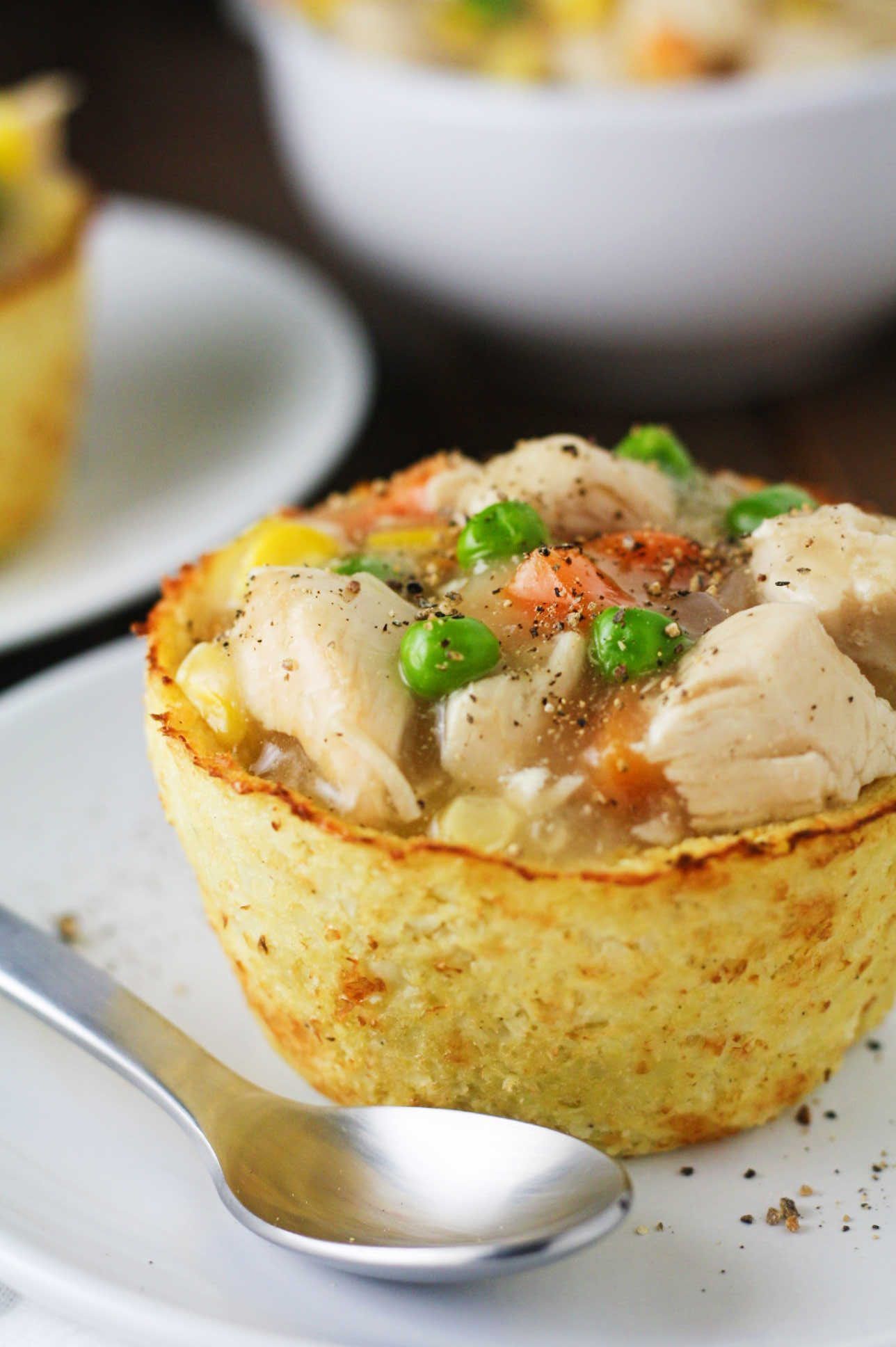 These Low Carb Cauliflower Pot Pies have all the flavors of a traditional chicken pot pie in guilt free form! Gluten free, low