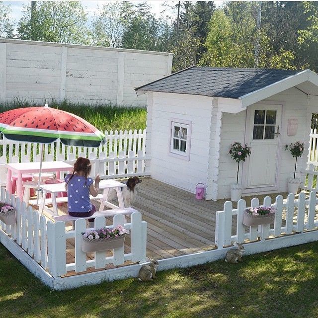 Playhouse and fenced patio