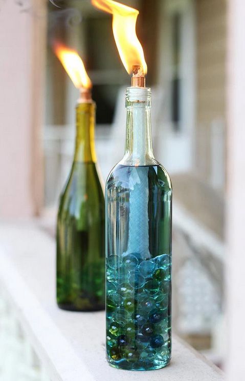 Keep bugs at bay while you relax outside with these wine bottle citronella candles.