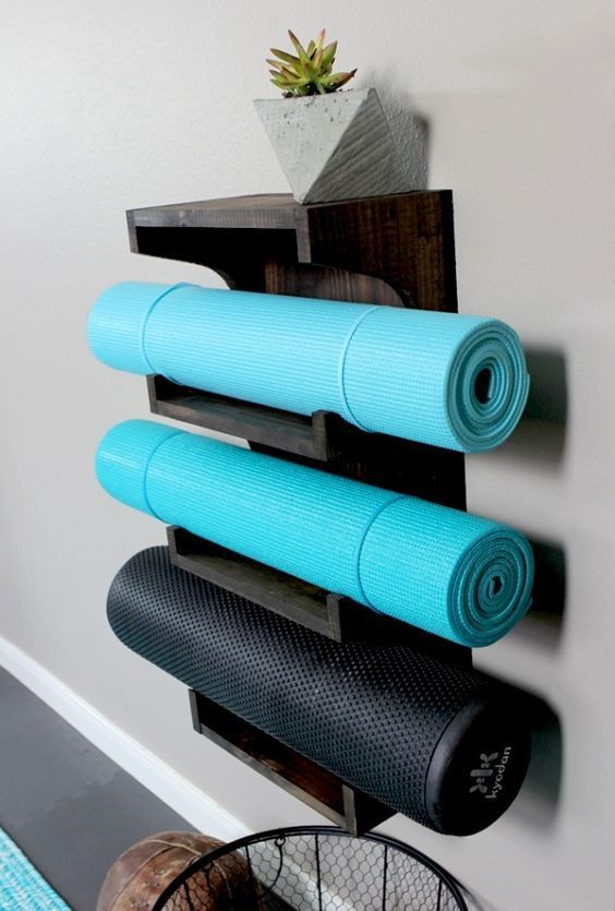 Keep your yoga mats on display with this DIY rack.