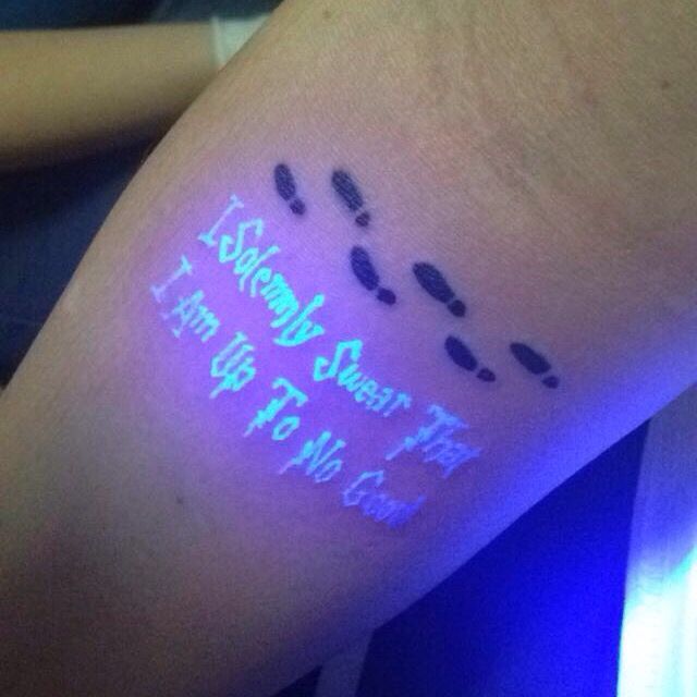 My new tattoo :-) inspired by Marauders Map from the Harry Potter series. The black light part is invisible to the eye with out UV