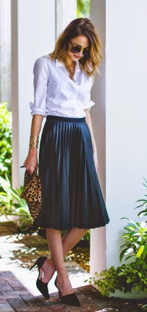 Taylor Morgan +  pleated skirt with heels and a white shirt  Shirt: J Crew, Skirt: Topshop, Heels: D’Orsay, Clutch: Clare Vivier